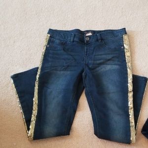 Two pairs of Justice jeans